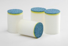 Abrasive-tipped projectiles for cleaning light rust or scale from tubing or pipe.